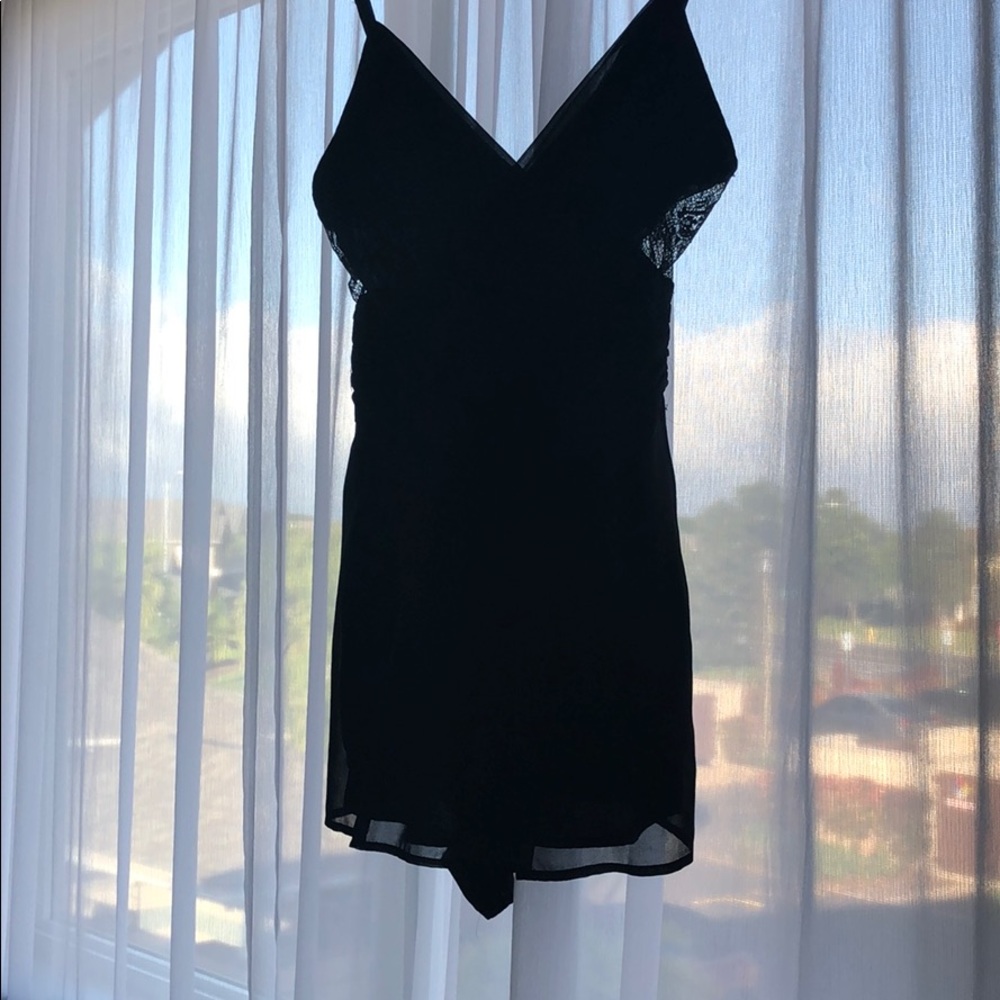 Keepsake black romper with lace cutout